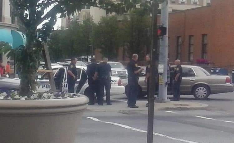 Man in suit arrested on charges he accosted a woman man in the parking garage next to 270 North Avenue
