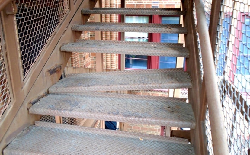 Image of a broken step contained in a recent Building Condition Survey