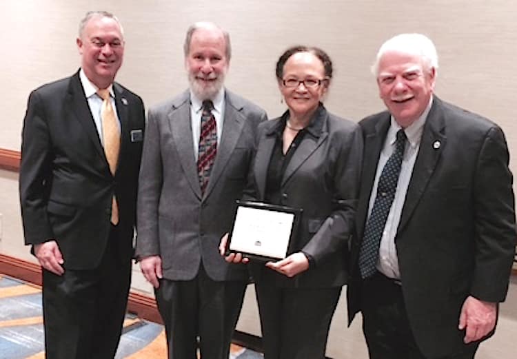 Hon. Jeffrey L. Levin,  Vice President of the NRBA;  Dr. Jeffrey Korostoff,  retired Assistant Superintendent of Schools;  Paula Johnson Kelly, President of the NRBA;   Hon.  Richard A. Sosis,  member of the Board of Directors of the NRBA (l. to r.)