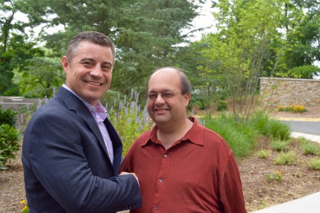 Alfred Menna from City School District of New Rochelle with Discovery Educations Lance Rougeux.