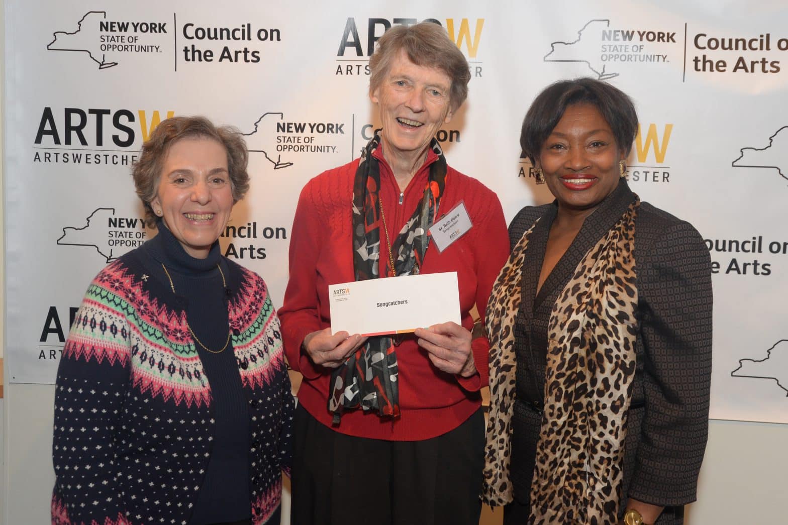 Songcatchers: (From left) Angela Belsole and Sr. Beth Dowd, OSU (representing Arts Alive grantee Songcatchers), and New York State Senator Andrea Stewart-Cousins. Songcatchers of New Rochelle will use the Arts Alive Grant for Intergenerational Community Music Programs. Collaborative events in New Rochelle will feature a junior choir with local seniors. These events will provide an intergenerational, musical and social experience for student and senior participants as well as an entertaining experience for t