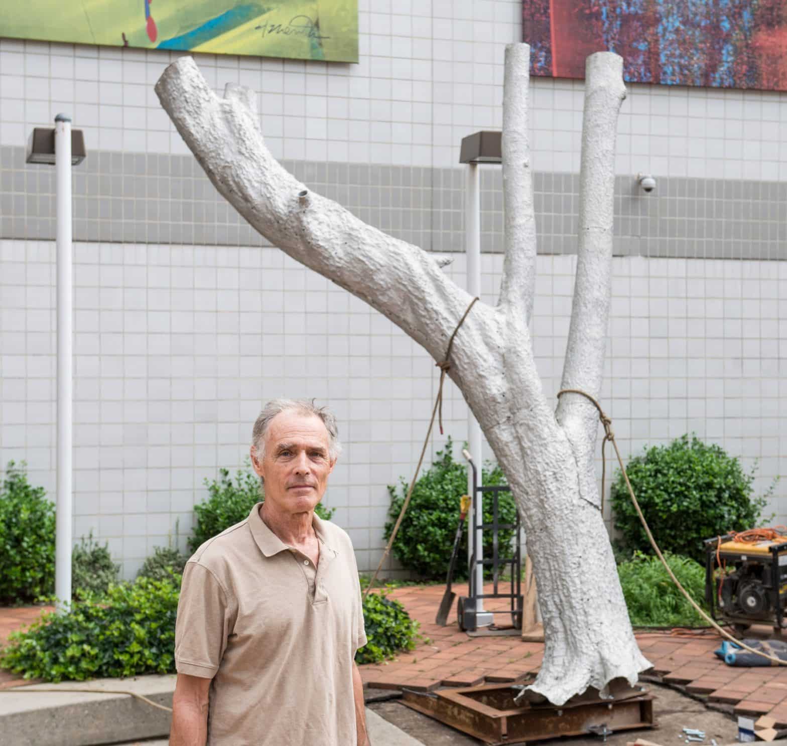 Robert Lobe with his sculpture X