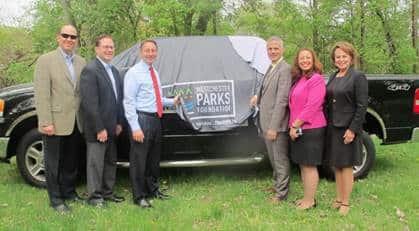 Westchester Parks Foundation receives a new pickup truck from Thalle Industries for its Graffiti Squad Program. From left: Seth Mandelbaum, Marc Berman, Robert P. Astorino; Glenn Pacchiana, Joanne Fernandez and Elizabeth Bracken-Thompson.
