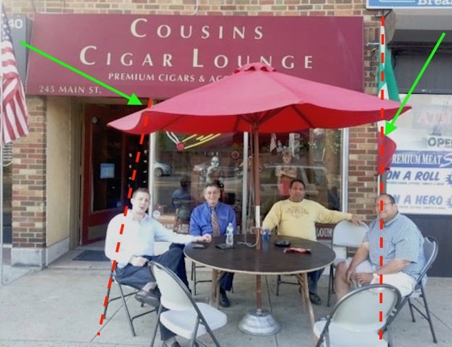 Cousins Cigar Illegal Sidewalk Cafe -- Blocking entrance, extending to other storefront
