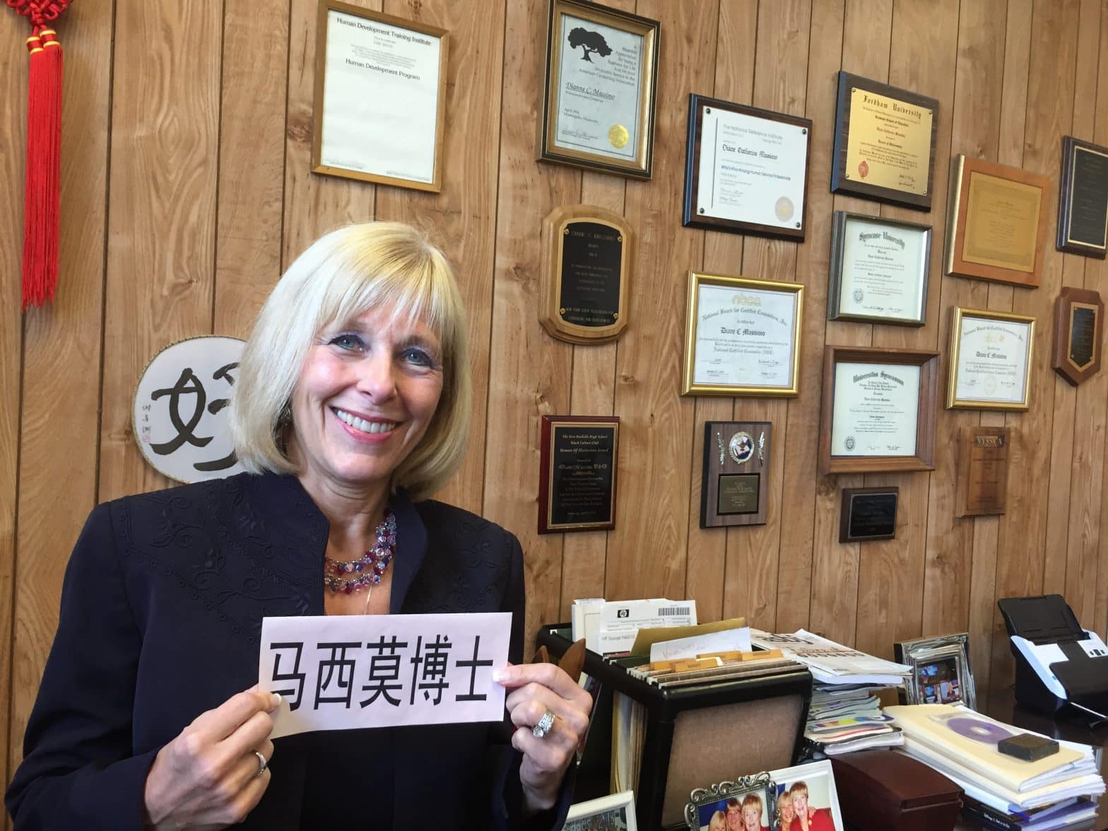 Dr. Massimo displays her name written in Chinese characters