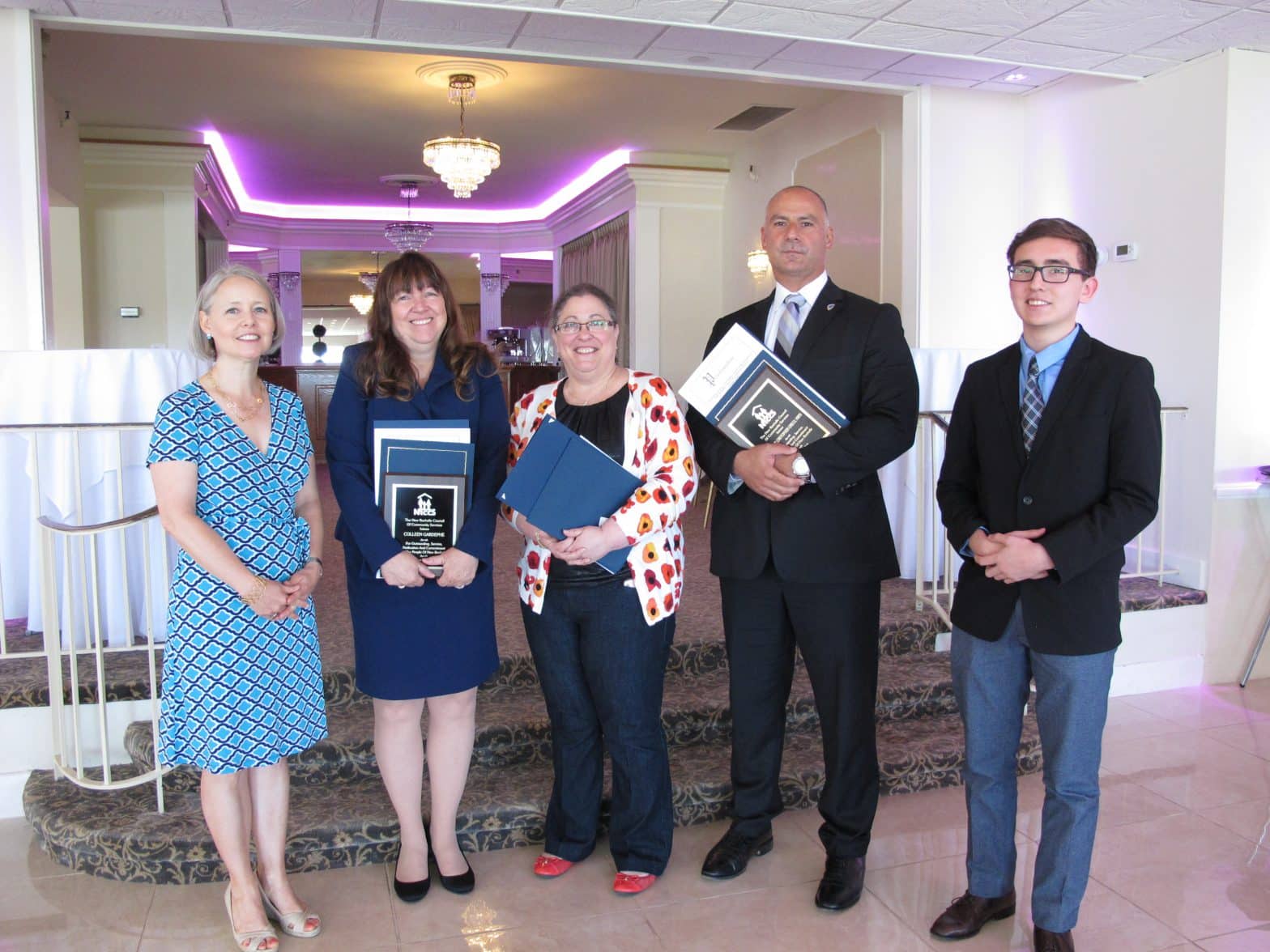 NRCCS president Stephanie Tomei with honorees Colleen Gardephe, Amy Tietz, and Det. Chris Greco, and scholarship winner Sebastian Gonzalez