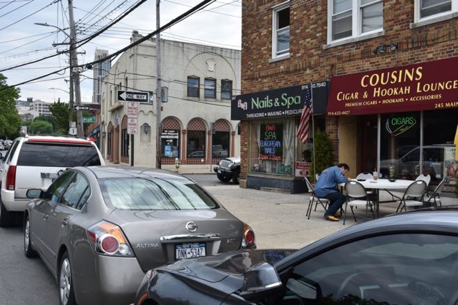 Photo Taken on June 21 to Document Signage and Illegally Parked Vehicles IFO 245 Main Street