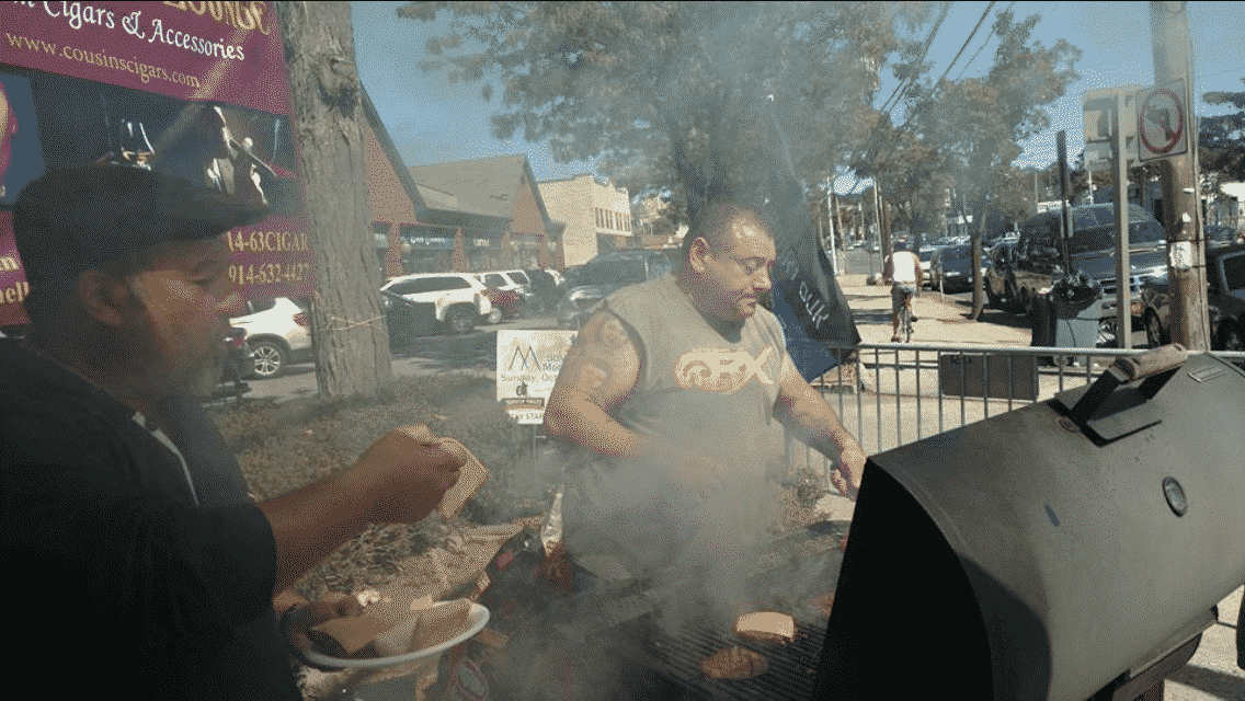 Illegal cookout on sidewalk near Cousin's Cigar & Hookah Lounge