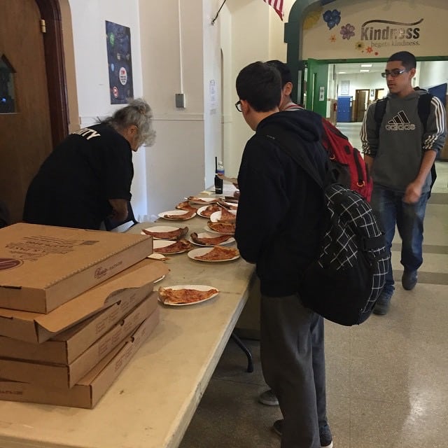 Linda Frasca selling pizza at Isaac Young