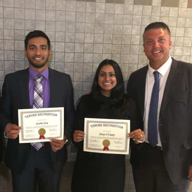 Newly tenured Albert Leonard Middle School teachers Justin Jose and Jessy O'Casey with Principal John Barnes.