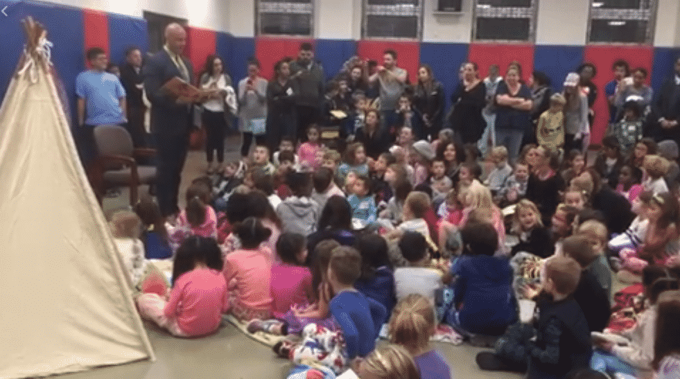 William B. Ward Principal Franco Miele Shared the Picture Book "Wild About Books" Students