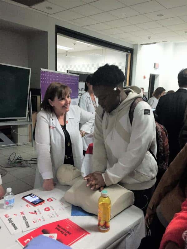 NRHS senior Nasir Dunham practices CPR.