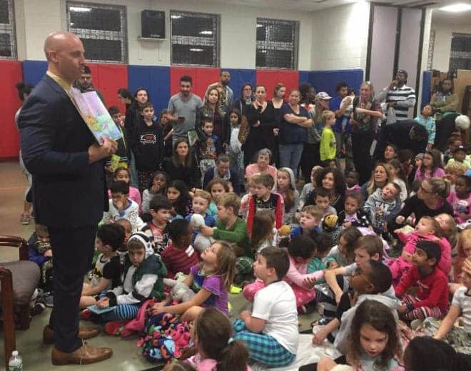 Principal Franco Miele Reads to Students on P.J. Storytime night