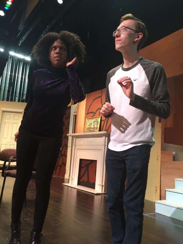 Elwood P. Dowd (NRHS senior Nicholas Baker, right) introduces Mrs. Ethel Chauvenet (senior Brea Watkins) to his new invisible friend in a Theatre Works rehearsal of Harvey.