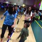 College students and former Maria Fareri Children's Hospital patients share the dance floor during the IonaTHON Dance Marathon