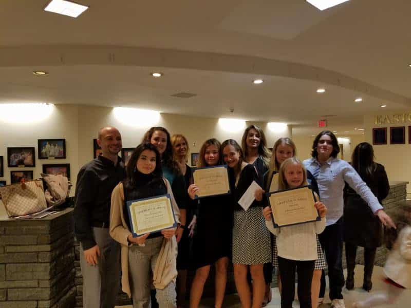 District students with their certificates from the Italian Heritage and Culture Month ceremony.