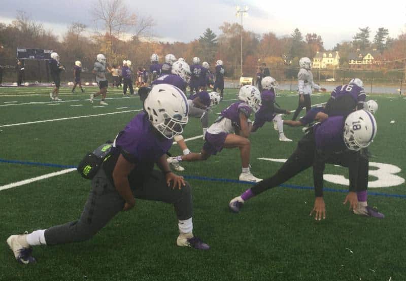 The football team stretches before practice this week.