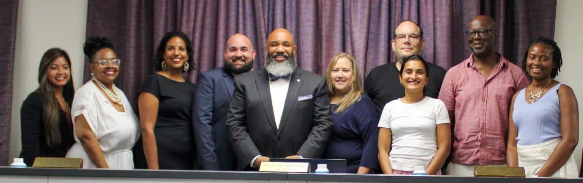 Left to right: Millie Bonilla (Clerk and Secretary to the Board of Education), Valarie D. Williams (board member), Adina Berrios Brooks (Vice President), William Iannuzzi (President), Dr. Corey W. Reynolds (Superintendent), Margaret Bavosa (board member), Don Vega (board member), Roshanie Ross (board member), David Peters (board member), Makeda Lewis (board member). Not pictured: Katie Castellano Minaya (board member).