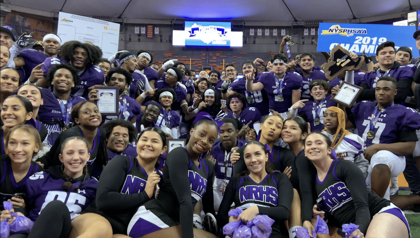 New Rochelle Huguenots after winning the 2019 AA State Championship at the Carrier Dome.