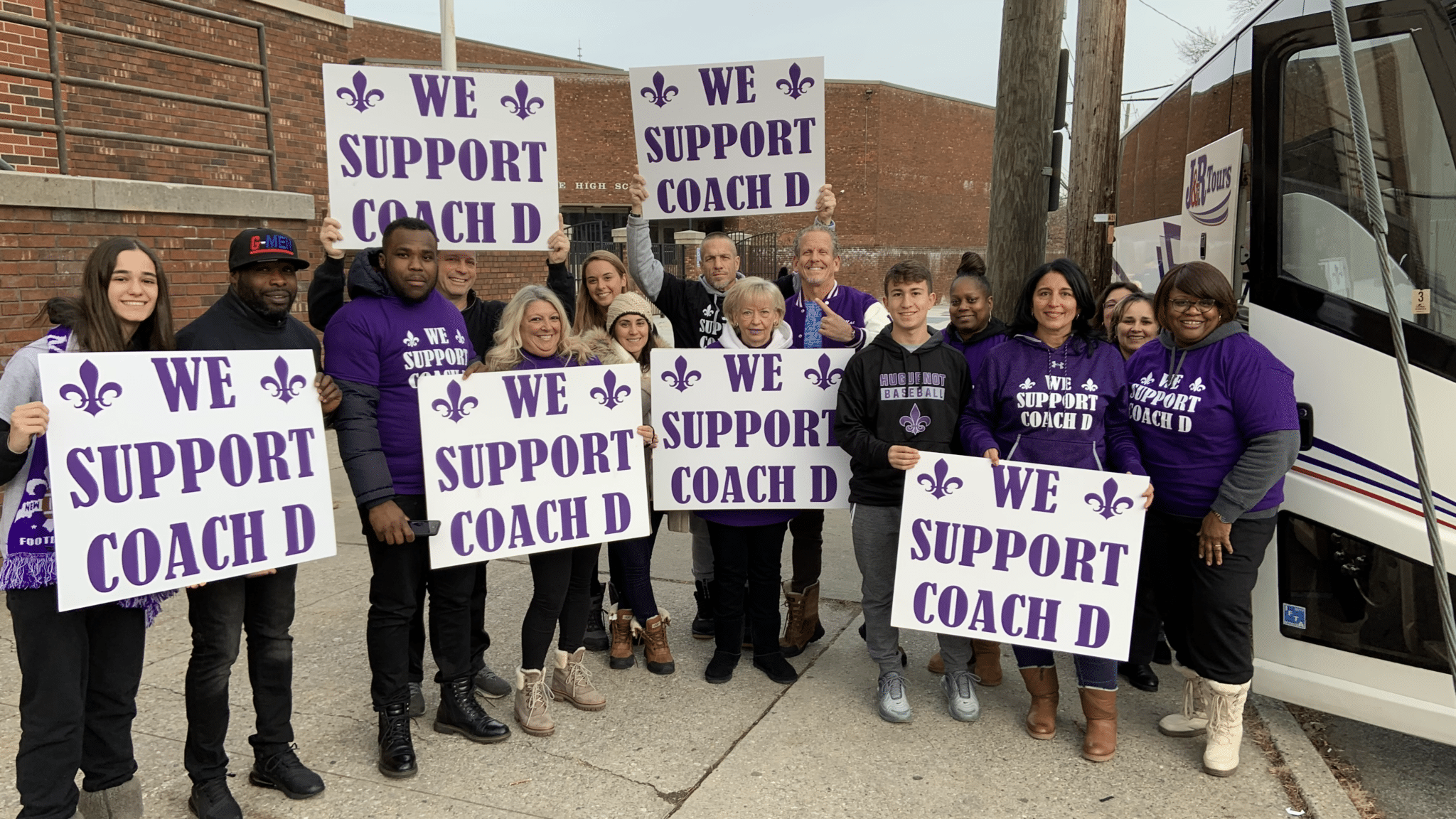 Coach D supporters board bus to Syracuse.